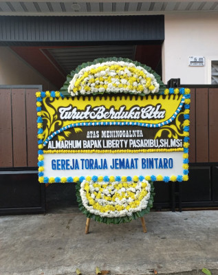 Papan Bunga Duka di Numba